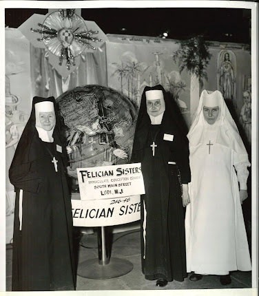 Three sisters standing in front of a globe and religious wall hangings with a sign that reads Felician Sisters Immaculate Conception Convent South Main Street Lodi, N.J. 246-46 Felician Sisters.